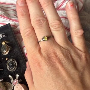 Elegant Silver and Yellow Gemstone Ring